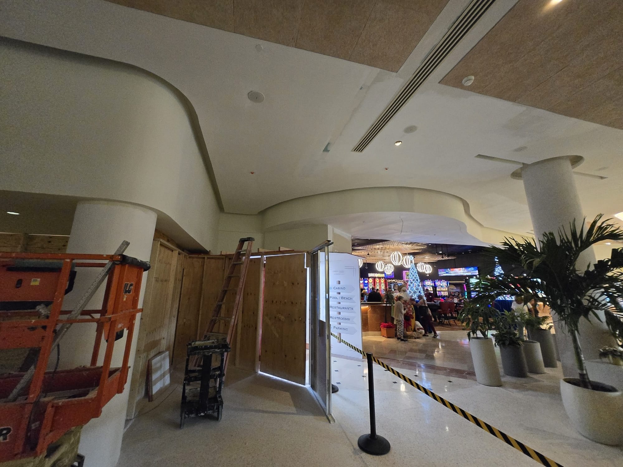 Curved ceiling and column installation in the hotel lobby